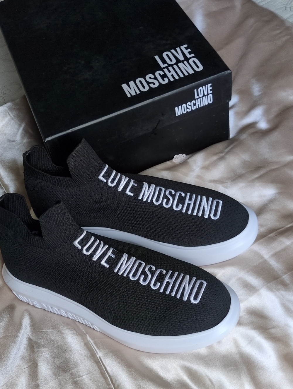 Love Moschino Women's Black Knit Slip-On Sneakers with White Logo